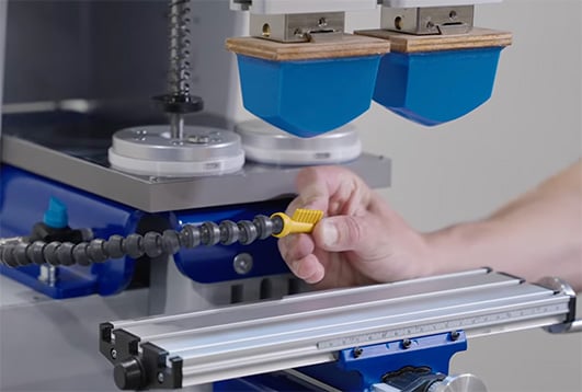 TTN pad printer blower set being adjusted.