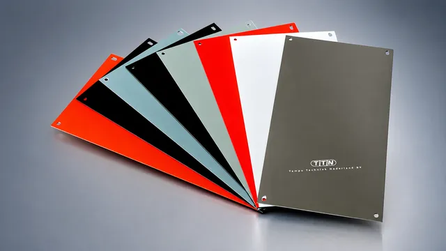 A fanned display of various pad printing cliches offered by Automark, including water wash, alcohol-based, and laser-engravable types, showcasing different colors and materials.