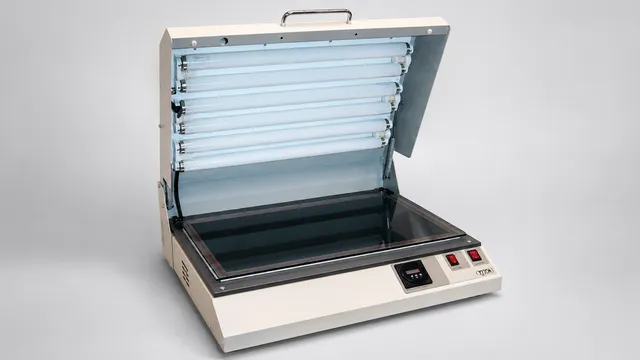 Automark TTN Mark GF II UV Exposure Unit, a professional-grade cliche maker with vacuum function, shown with its lid open, revealing multiple UV lamps, a vacuum frame, and a digital control panel, designed for producing the finest pad printing plates.