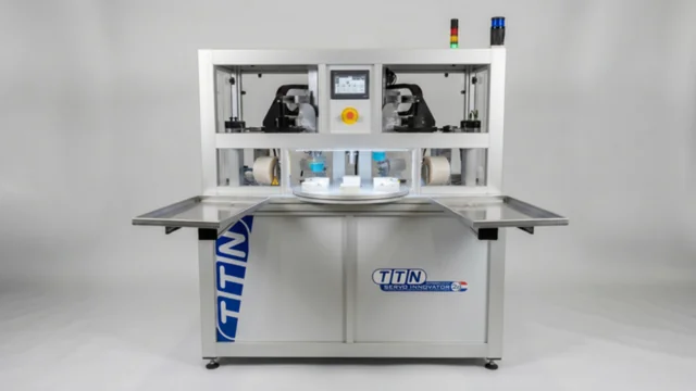A TTN two-color Servo Innovator series pad printer, a high-speed industrial machine capable of printing up to 1,500 multi-color parts per hour, distributed by Automark.